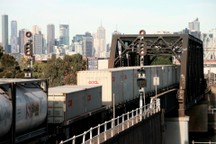 Freight train crossing Maribyrnong River and entering Bunbury Street Railway Tunnel